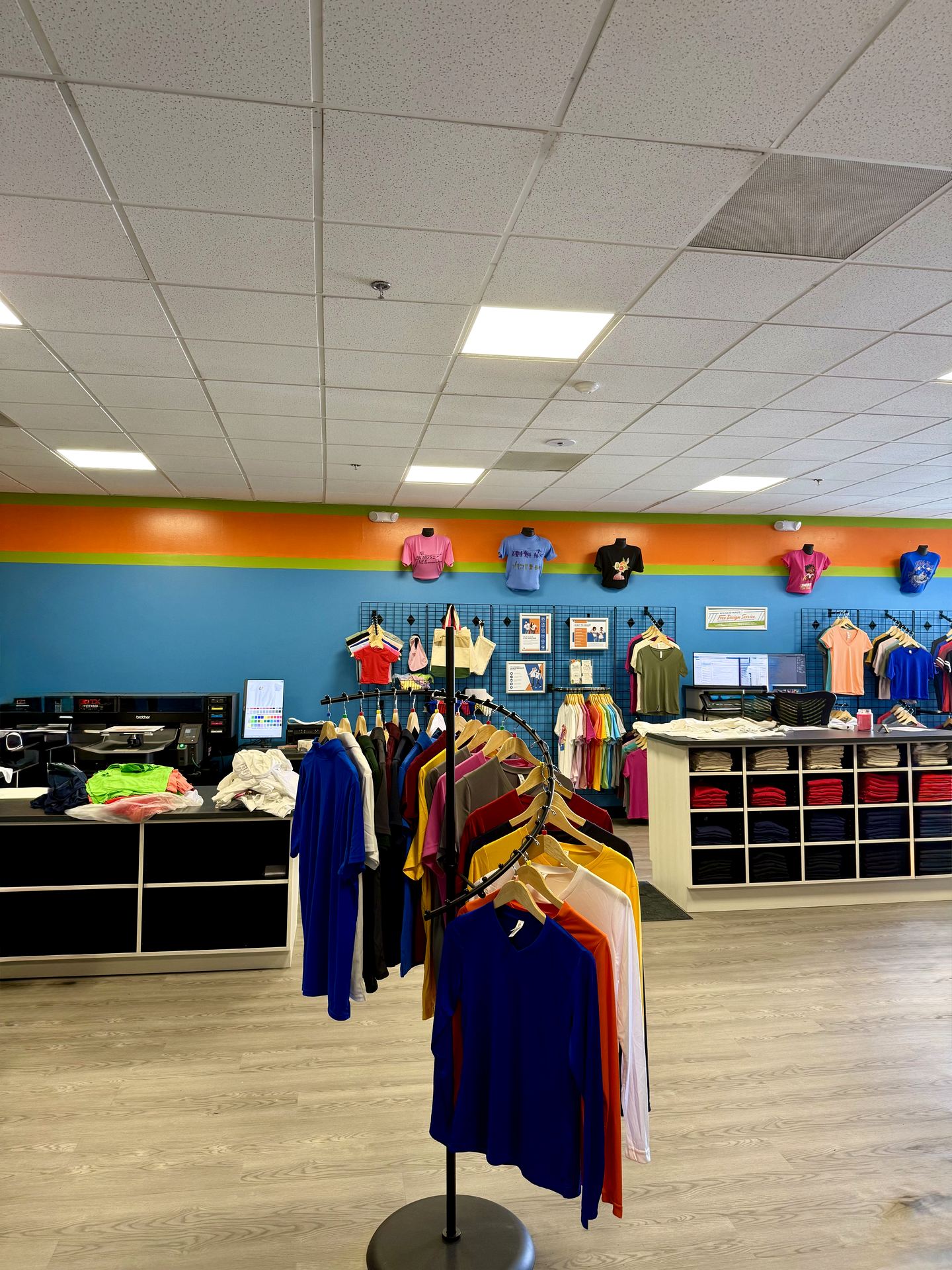Back-of-house production area with custom counters and branded feature wall, Santa Monica retail buildout by ASEP Contractors